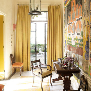 Immagine di un ingresso o corridoio boho chic con pareti bianche, una porta a due ante e una porta in vetro