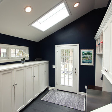 48" High Cabinets Under Transom Windows in Mudroom with Vaulted Ceiling