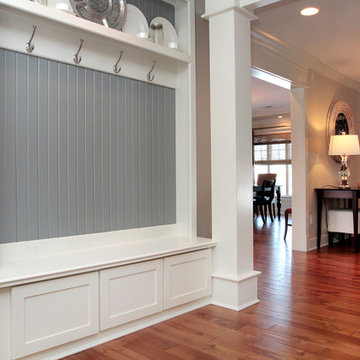 A chef's kitchen with cozy hearth room and spacious dining room