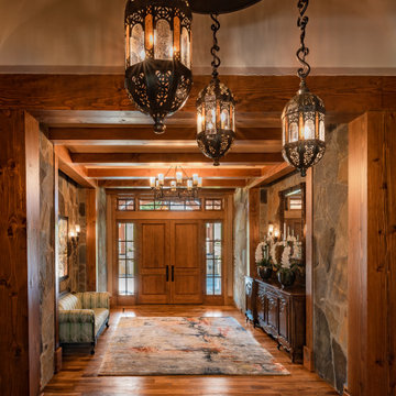 A Rustic Estate by Home Front Interiors, Inc; Custom lighting by Santangelo Ligh