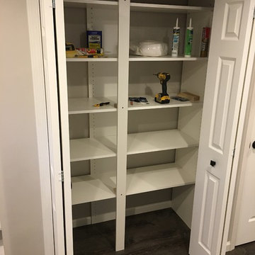 Adjustable storage shelving in closet