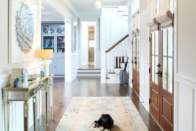 Photo of a traditional entrance in Wilmington with dark hardwood flooring.