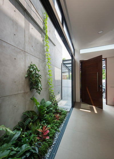 Contemporary Entrance by ADX Architects