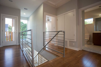 Contemporary entrance in Baltimore with bamboo flooring and brown floors.