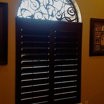 Arched Window with Wood Shutters and Tableaux Faux Iron