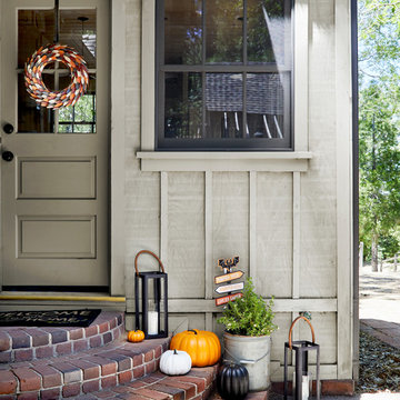 Back Door Decor with Pumpkins and Lanterns Collection style by Emily Henderson