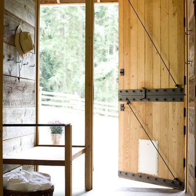 Dutch front door - country dutch front door idea in Seattle with a medium wood front door