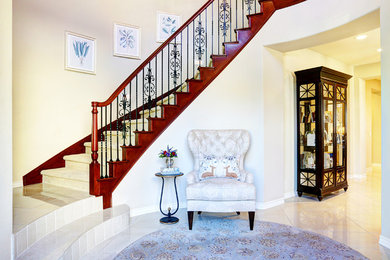 Transitional entryway photo in Los Angeles with white walls