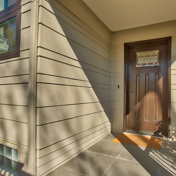 Beautiful entry with custom siding reveal