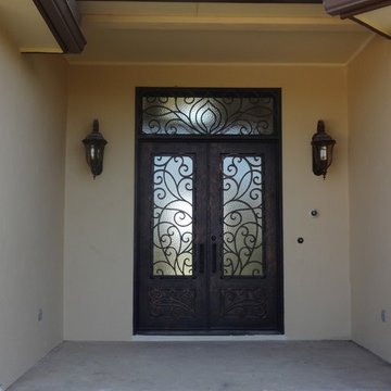 Beautiful Wrought Iron front door with wrought iron detailing