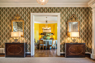 Large elegant medium tone wood floor entryway photo in Nashville with multicolored walls