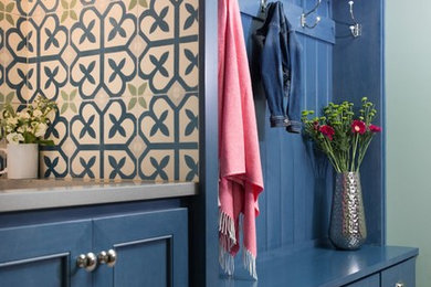 Inspiration for a timeless dark wood floor mudroom remodel in Chicago with blue walls