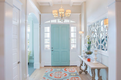 Inspiration for a beach style entrance in Salt Lake City with beige walls, light hardwood flooring, a single front door and a blue front door.