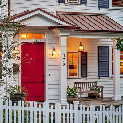 Example of a classic entryway design in Los Angeles with a red front door