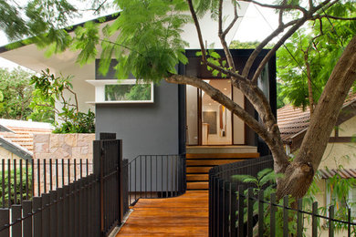Inspiration for a contemporary front door in Sydney with a single front door.