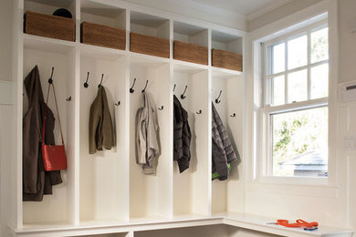Mudroom - large transitional ceramic tile mudroom idea in Boston with white walls