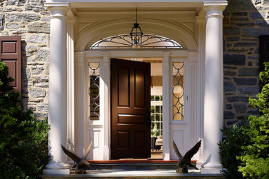 Inspiration for a timeless entryway remodel in Philadelphia with a black front door