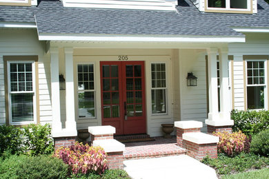 bungalow with front porch at entrance doors