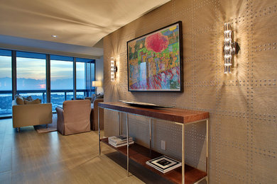 Example of a large trendy porcelain tile entryway design in Miami with beige walls