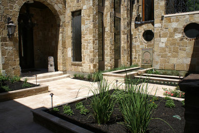 Inspiration for a mediterranean entryway remodel in Houston