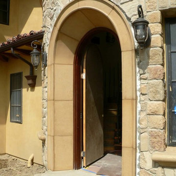 Cast stone precast entry arch.