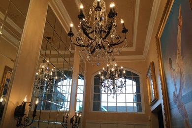 Chandeliers and Wall Sconces in Entry Way