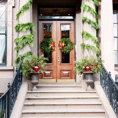 Inspiration for a timeless front door remodel in Boston with a medium wood front door