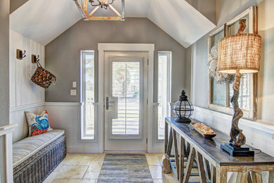 Example of a beach style entryway design in Austin
