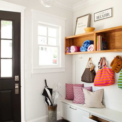 Inspiration for a small transitional dark wood floor entryway remodel in Atlanta with white walls and a black front door