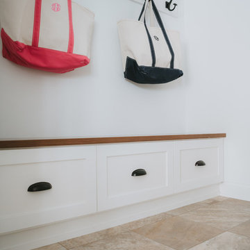 Classic White Mudroom with Hooks and Bench