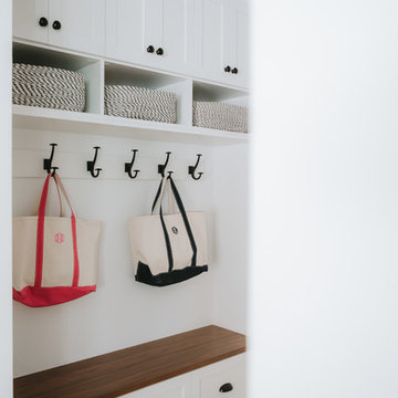 Classic White Mudroom with Hooks and Bench