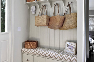 This is an example of a medium sized beach style boot room in Charleston.