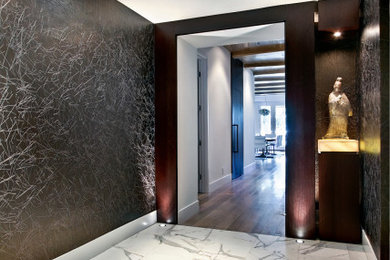Entryway - mid-sized coastal marble floor, white floor and wallpaper entryway idea in Los Angeles with gray walls
