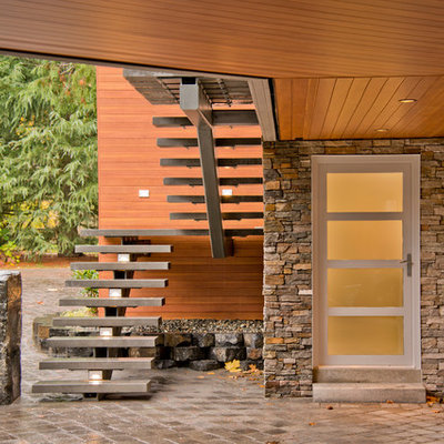 Entryway - contemporary entryway idea in Vancouver with a glass front door