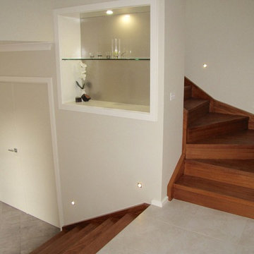 contemporary entry with metallic backed display