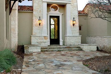 This is an example of a mediterranean entrance in Austin.