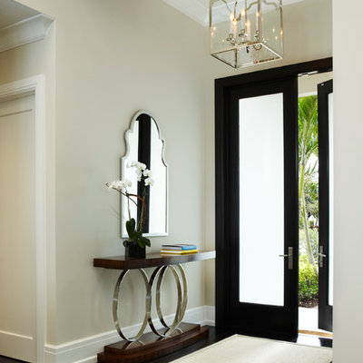 Entryway - transitional entryway idea in Miami with beige walls
