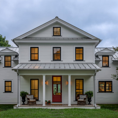 Inspiration for a cottage entryway remodel in New York with a red front door