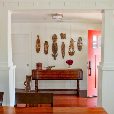 Mid-sized elegant dark wood floor and brown floor entryway photo in San Diego with a red front door and white walls