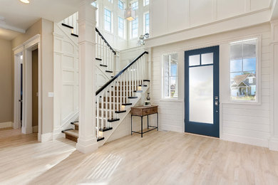 Example of an arts and crafts entryway design in Tampa