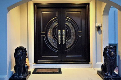 Inspiration for a double front door remodel in Orange County