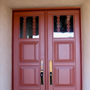 Custom hand carved front entry doors