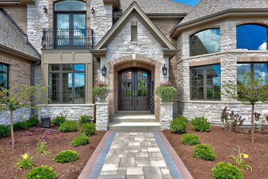 Inspiration for a classic front door in Chicago with a double front door and a dark wood front door.