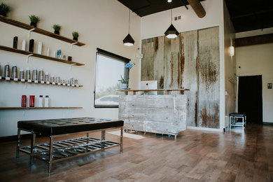 Foyer - mid-sized transitional light wood floor foyer idea in San Luis Obispo with white walls