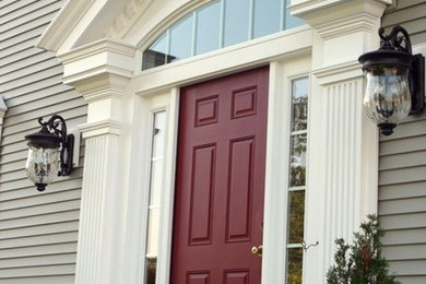 Example of a large ornate front door design in New York