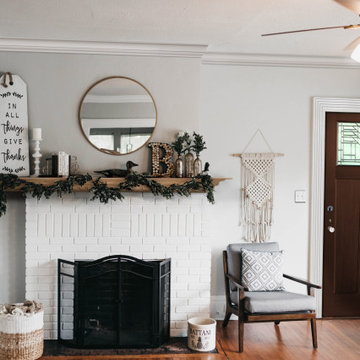 Eclectic & Simple Home with Mantel over a Brick Fireplace, Moulding, and a Gorge