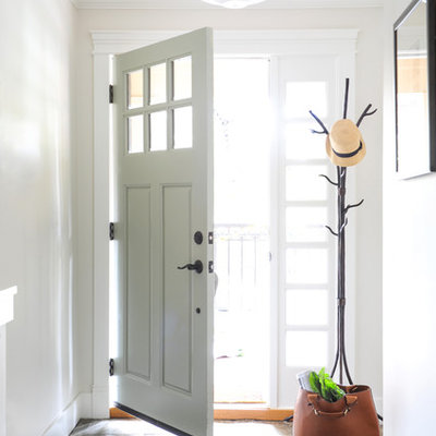 Small transitional slate floor entryway photo in Vancouver with white walls