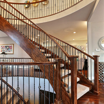Edgey Greenwood Village, Colorado Home with Stained Wood Spiral Staircase