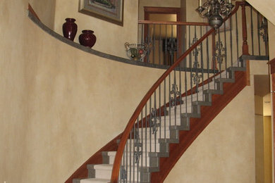 Elegant curved stairway.
