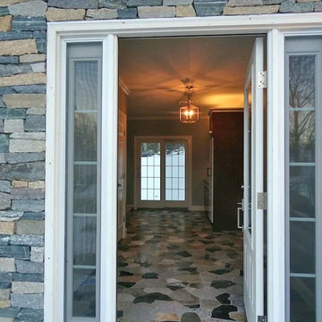 Elegant Entrance and Fireplace Mixing Stone Colors and Types